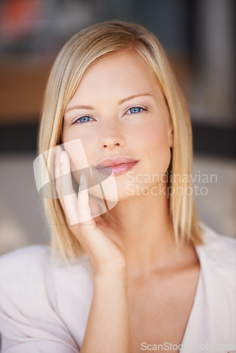 Image of Portrait, beauty and a woman with hands on face for natural makeup, cosmetics and glow on skin. Female model person from Canada for self care, skincare and confidence for dermatology headshot