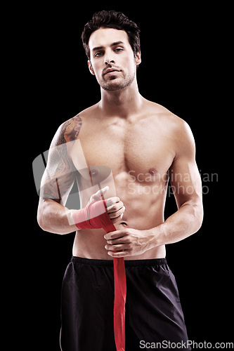 Image of Boxer, serious and portrait studio man training for exercise on black background at the gym. Boxing, model and fight in champion sport for body workout for health and wellness as motivation.
