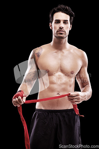 Image of Sports man, challenge and boxer in portrait studio for professional competition for workout. BoxIng, training and hand for fight with exercise for the body with focus and motivation for fitness.