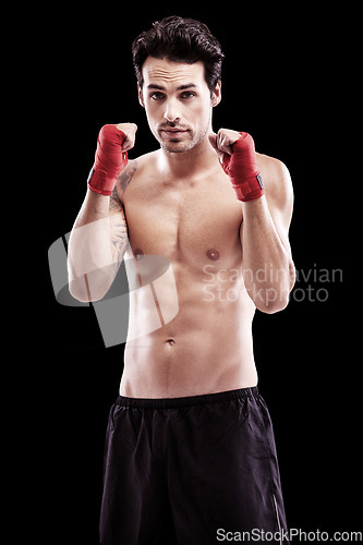 Image of Boxing, man and portrait in studio for fitness exercise in competition martial arts training. Champion, fist and model for professional workout with focus on health and wellness goal at sport club.