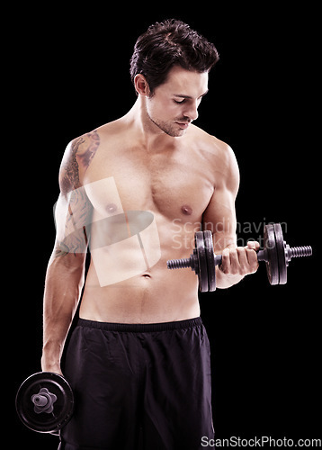 Image of Strong, man and dumbbell exercise on black background, dark studio and gym workout for sexy six pack. Topless bodybuilder, sports athlete and muscle training with weights, fitness power and challenge