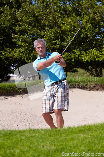 Image of Sports, portrait and old man with golf club swing outdoor for fitness, training and practice. Face, golfing and senior male golfer swinging driver in a park, serious and enjoying retirement hobby