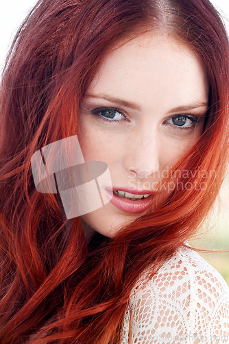 Image of Redhead, beauty closeup and woman portrait outdoor with ginger hairstyle and treatment. Hair care, female person youth and young model face with confidence and beautiful hairstylist haircut outside