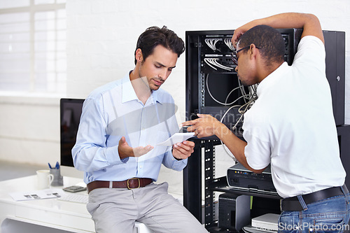 Image of Server room, it support and instructions with a man engineer explaining to a business man about cyber security. Network, database and solution with a technician chatting about information technology