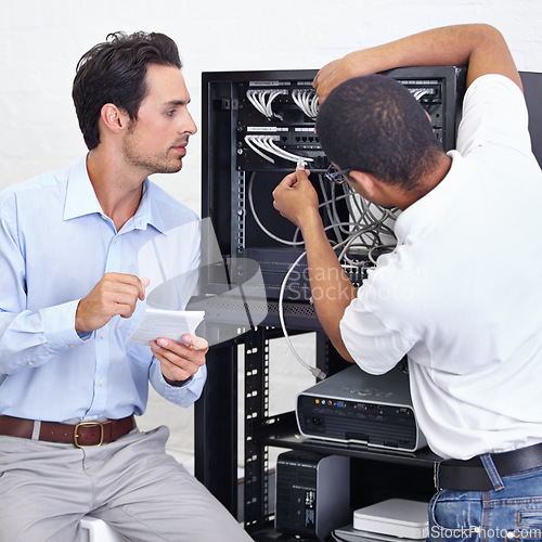 Image of Server room, businessman or electrician fixing cables for maintenance after digital glitch in office. Network, hardware or worker with a technician or electrical engineer for information technology