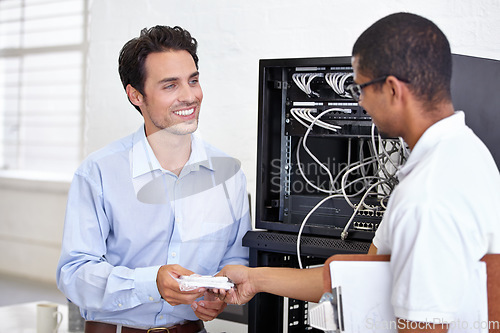 Image of Server room, man or technician giving modem hardware for maintenance for connection in business office. Electronics, help or worker with an electrician or tech support for information technology