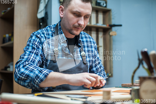 Image of Concept of handmade craft production of leather goods.