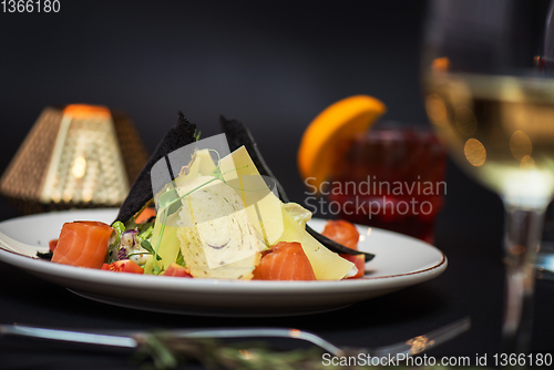 Image of Caesar salad with salmon fish