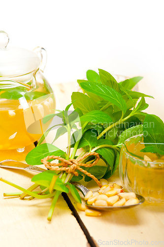 Image of Arab traditional mint and pine nuts tea