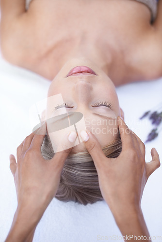 Image of Relax, massage and hands on face, woman in spa for health, wellness and luxury treatment with eyes closed. Beauty salon, professional skin care therapist and healthy facial, girl on table from above.
