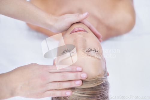 Image of Relax, acupressure and facial massage, woman in beauty salon for health, wellness and luxury treatment with eyes closed. Spa, professional skin care therapist hands on healthy face of girl from above