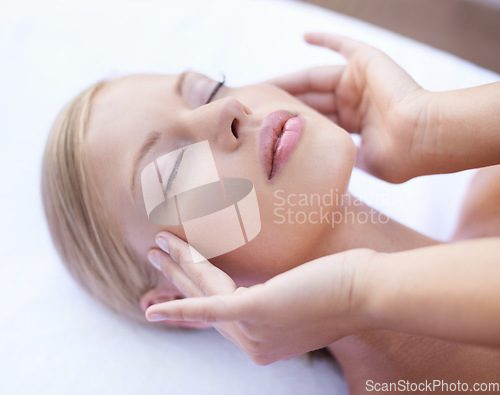 Image of Acupressure, facial massage and woman at spa for health, wellness and healing, luxury skincare treatment. Beauty salon, skin care and girl with hands on face, dermatology and anti ageing therapy.