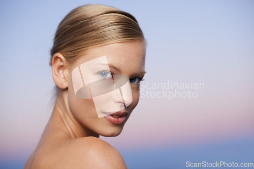 Image of Woman in portrait, face and beauty with natural care, cosmetics and healthy skin mockup space for wellness. Female model, dermatology and skincare, facial spa treatment or hygiene and grooming on sky