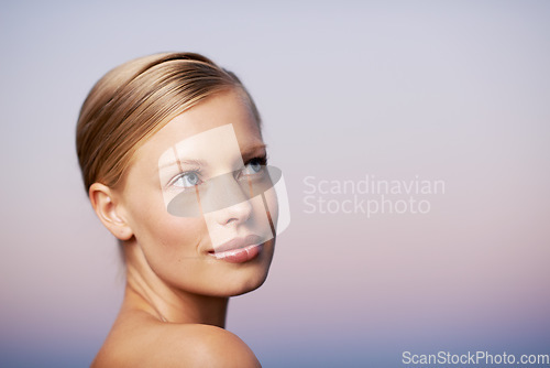 Image of Woman with think face, beauty and natural skincare or cosmetics, healthy skin mockup with wellness. Female model, dermatology and care, facial spa treatment with hygiene or grooming on sky background