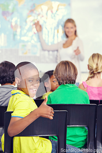 Image of Portrait, black child and thumbs up of student in class, elementary school or classroom. Funny, education and kid with hand gesture for like emoji, agreement or learning, success and approval sign.