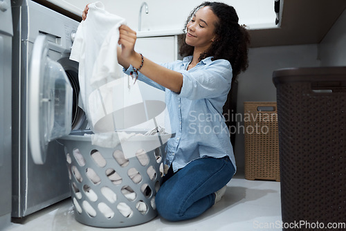 Image of Woman check laundry, washing machine and clothes with basket, housekeeping with fresh linen and hygiene. Housekeeper, female person smile with housework, cleaning and electric cleaner appliance