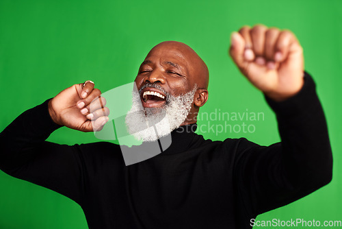 Image of Happy, dance and face of of black man on green screen for celebration, music or excited. Happiness, smile and energy with senior person dancing isolated on studio background for freedom and movement