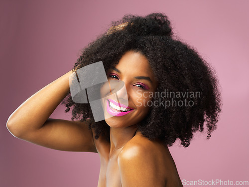 Image of Hair care, face and smile of black woman with afro in studio isolated on pink background. Hairstyle portrait, makeup cosmetics and funny African female model with salon treatment for beauty lipstick.