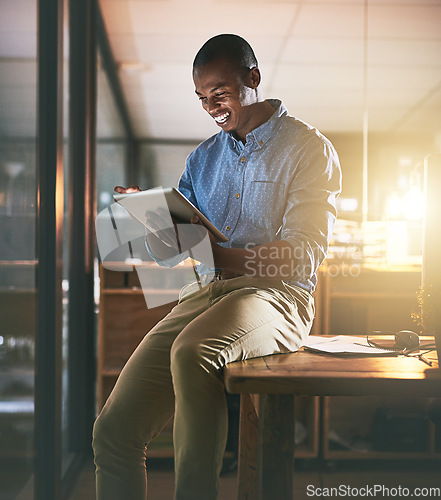 Image of Business, smile and black man with a tablet, typing and online reading with software, modern office and happiness. Male person, employee or entrepreneur with technology, connection and communication