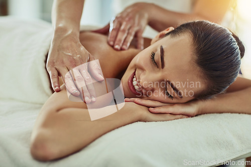 Image of Smile, beauty and massage with woman in spa for wellness, luxury and relax treatment. Skincare, peace and zen with female customer and hands of therapist for physical therapy, salon and detox