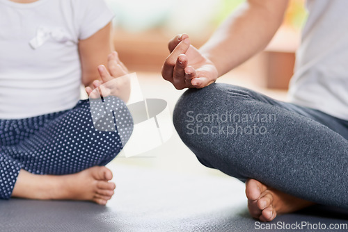 Image of Meditation, relax and hands of mother and daughter for yoga, fitness and peace. Zen, calm and workout with closeup of woman and young child training at home for exercise, wellness and health