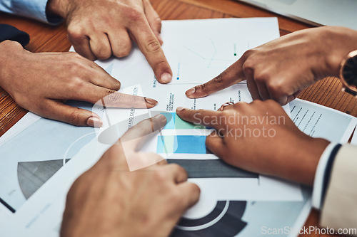 Image of Business people, hands and pointing to documents in analytics for meeting, data or company statistics at office. Hand of employee group in corporate team analysis, paperwork or planning at workplace