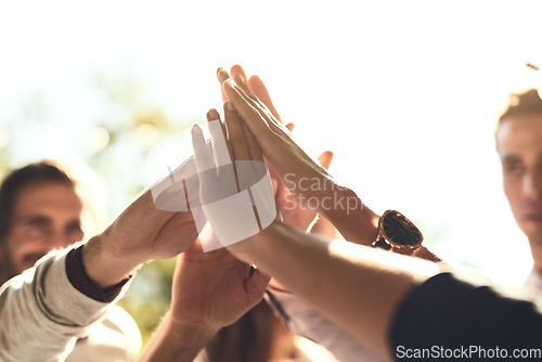 Image of Business people, hands and high five for teamwork, winning or success in unity or collaboration outdoors. Group touching hand in agreement, meeting or team building for win, support or goals together