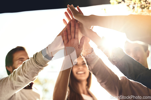 Image of Business people, hands and high five for team motivation, winning or success in unity outdoors. Happy group touching hand for teamwork, victory win or collaboration in solidarity together in nature