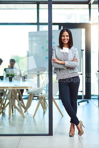 Image of Portrait, business and woman with arms crossed, startup and leadership with confidence, happiness or professional. Female person, employee and consultant with growth, development or meeting success