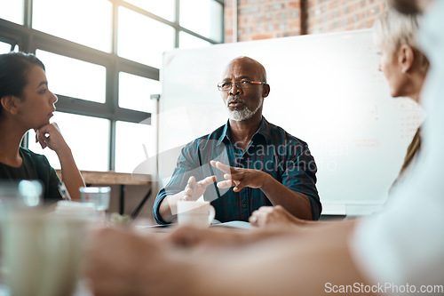 Image of Meeting, business people and leadership of black man in office, talking or speaking. Teamwork, ceo and senior African male professional brainstorming, collaboration or planning group strategy at work