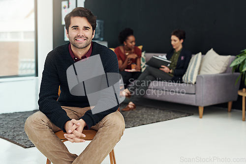 Image of Portrait, business man and smile on chair in office, workplace or corporate company. Face, confidence and male professional, entrepreneur and person sitting with happiness, pride for career or leader