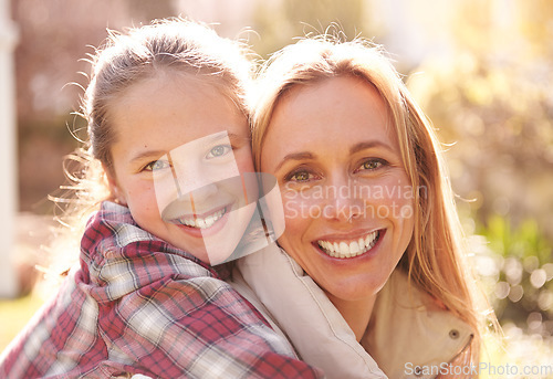 Image of Face portrait, hug and happy mother, children or family smile, bonding and spending outdoor time together. Mothers day, faces of daughter and smiling woman, youth child or young girl hugging mom