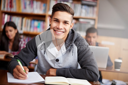 Image of Learning, writing and college with portrait of man in library for education, research and classroom quiz. Focus, study and notebook with student at university for knowledge, scholarship and project