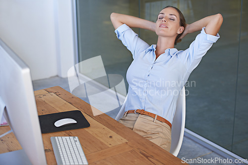 Image of Happy business woman, stretching and relax for easy break, deadline achievement and office desk. Female worker, hands behind head and eyes closed to finish goals, productivity or dream of inspiration