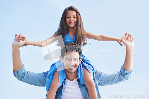 Image of Blue sky, piggyback and happy family portrait of father, child or people having fun, playing outdoor game and bonding. Shoulder ride, summer sunshine and relax kid and dad smile for peace and freedom