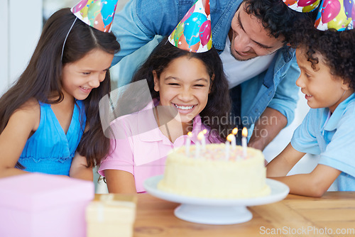 Image of Birthday party cake, father and happy kids celebrate special event with friends, family and surprise dessert food. Fun celebration, congratulations and children excited for youth growth of young girl