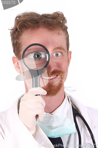 Image of smiling doctor with loupe