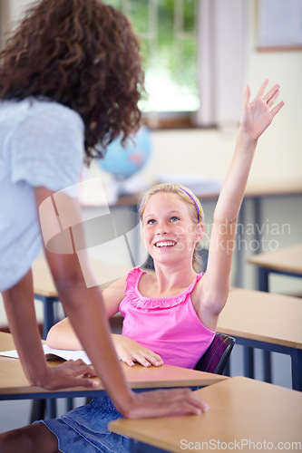 Image of Teacher, child and raise hand for questions, support and helping with education and teaching in school or classroom. Happy girl or kid with arm up for knowledge, learning and class talking or advice