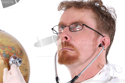 Image of funny doctor examine a globe 