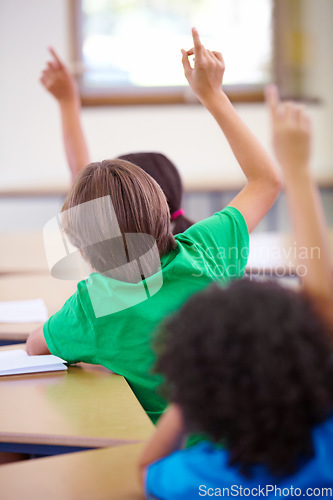 Image of Classroom, raise hands and children rear for questions, education and language learning or quiz in school. Young group, kindergarten or clever kids with arms up for students support, ideas or answer