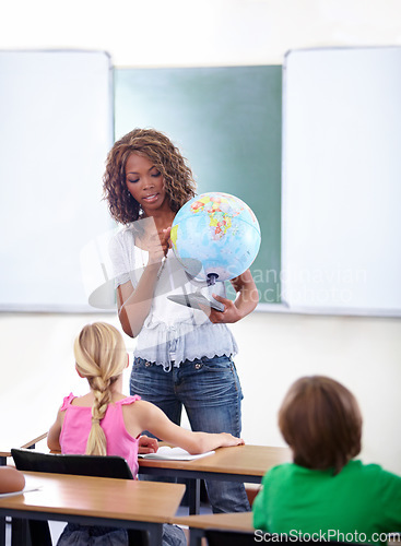 Image of Geography, woman or teacher with children in classroom for globe education, world learning or earth knowledge. African person, school or kids for teaching global information, planet and map location