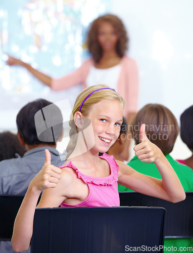 Image of Thumbs up, classroom and girl portrait for learning success, support and thank you sign for education, school or geography. Like, yes and achievement hands or emoji of happy child with map teaching