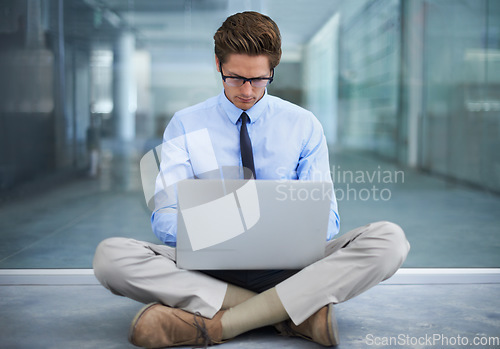 Image of Laptop, sitting on floor and business man or entrepreneur developer typing code data at remote work. Information technology, research and professional person working on computer for virtual project