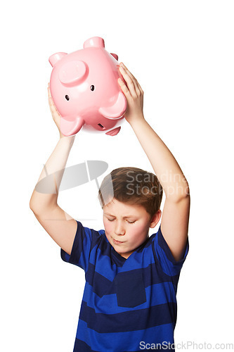 Image of Piggy bank, smash and young boy in studio for finance, savings and decision against white background. Money box, breaking and preteen male person with investment, cash and future financial freedom