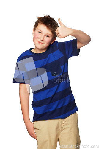 Image of Portrait, thumbs up and smile of child in studio isolated on a white background. Boy, hand gesture and kid with like emoji for agreement, success or thank you, yes sign or winner, ok and approval.