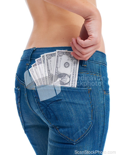Image of Budget, payment and money in jeans of woman for investment, success and growth. Cash, dollar and finance with girl customer isolated on white background for financial, savings and deal promotion