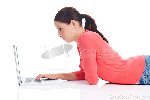 Image of Laptop, studio floor and woman reading internet, website or typing digital web search for research project. Online shopping promo, e commerce sales or relax model profile isolated on white background