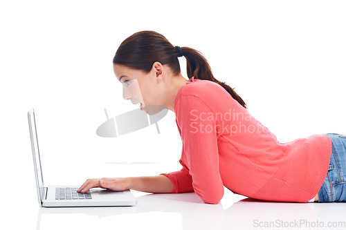 Image of Laptop, studio floor and woman with surprise from web store discount, retail promotion or shocking news. Online shopping wow, e commerce or model girl reading sales promo isolated on white background