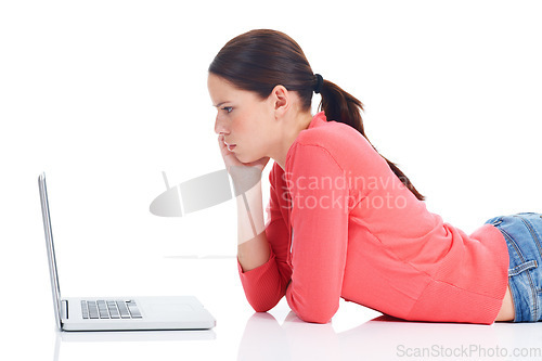 Image of Laptop, studio floor and woman reading online information, digital web screen or internet research news. Website study, education focus and profile of learning student isolated on white background