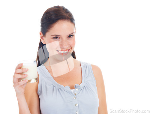 Image of Studio portrait, happy woman and glass of milk for vitamin D healthcare benefits, bone health or nutritionist hydration drink. Calcium dairy product, mockup and model isolated on white background